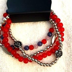Multi string stretch bracelet. Red, white, blue, and silver strands.